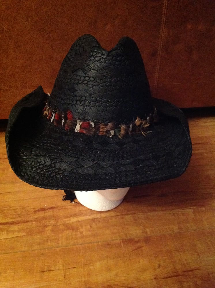 Image of black straw cowboy with mixed feather band