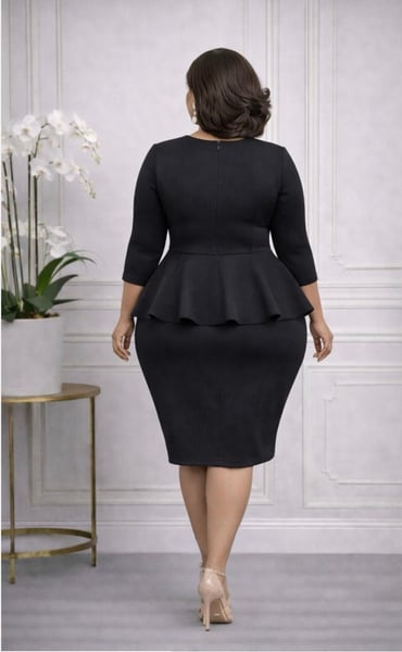 Image of THE GRACEFULLY RUFFLED PEPLUM DRESS