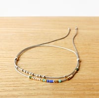 Image 5 of Bracelet lien cordon gris "Pã" 