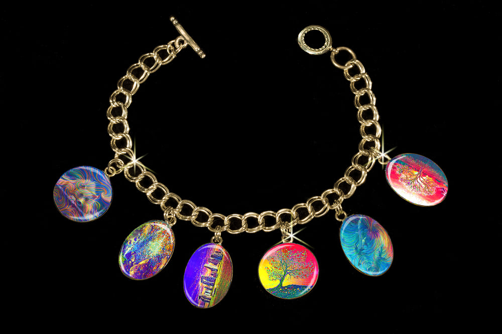 Image of Energy Healing Charm Bracelet by Julia Watkins. Use discount code HEAL50 to get $50 off this item.