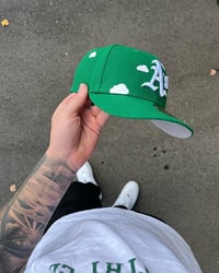 Image 1 of  PARTLY CLOUDY GREEN OAKLAND ATHLETICS CUSTOM FITTED CAP