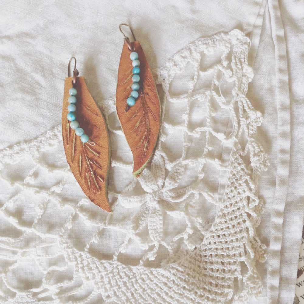 Image of Leather feather earrings