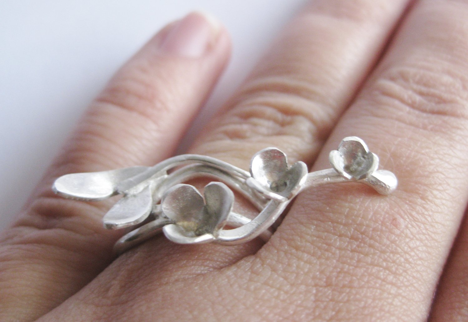Image of Trailing bud ring in forged sterling silver
