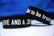 Image of "Not to be Trusted" Rubber Bracelet