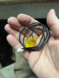 Image 5 of Baltic Amber Skull pendant.