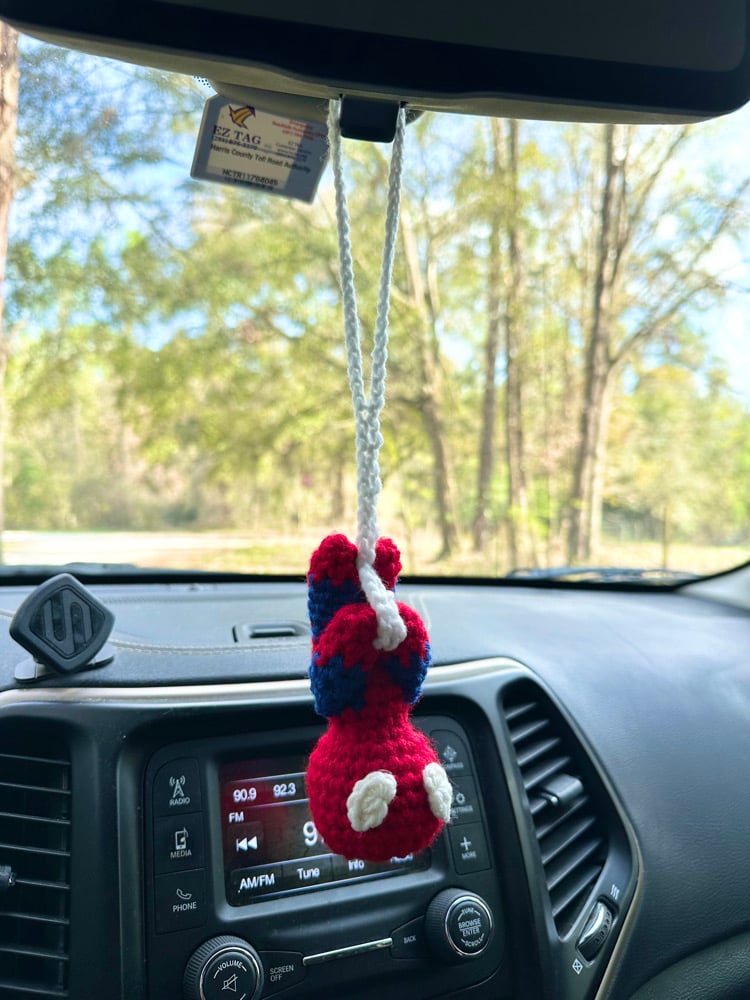 Image of spiderman car hanging