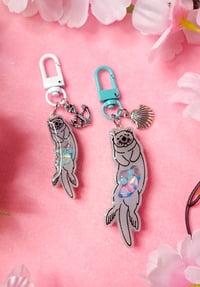 Image 1 of Sea Otters Resin Shaker Charms