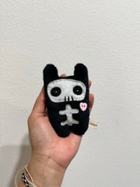 Skull Bun (pink heart)