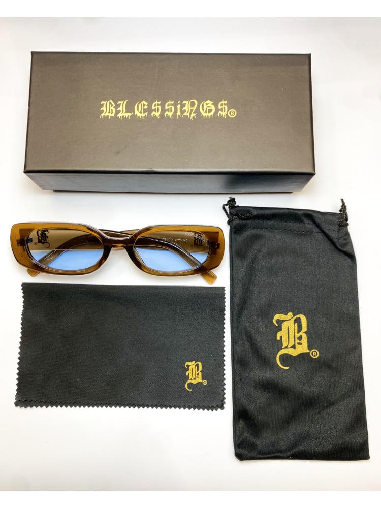 Image of BLE$$ING$®️ CLEAR BRN FRAMES / BLUE TINT