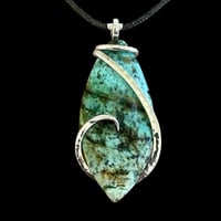 Image 1 of Tibetan Turquoise with Sterling Silver Wave Wrap (#37)