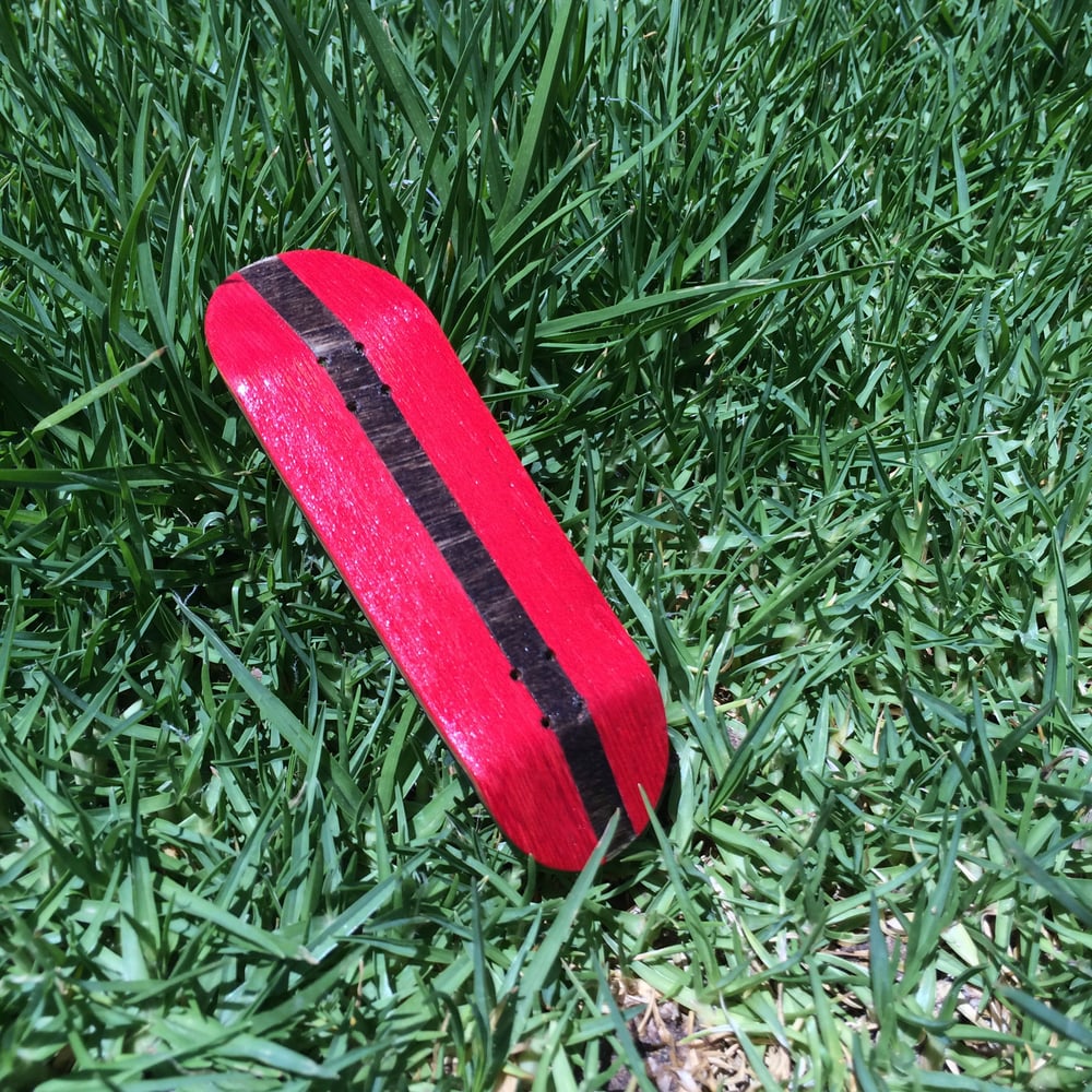 Image of red/ebony split ply deck
