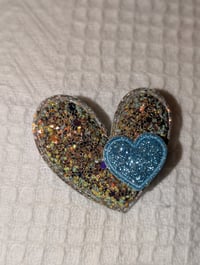 Broche coeur lila