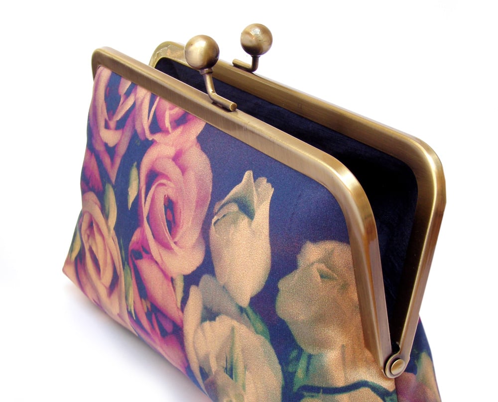 rose coloured clutch bag