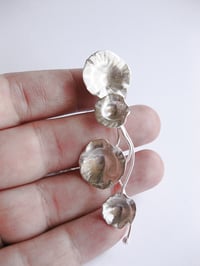 Image 1 of Trailing daisy pendent in forged sterling silver