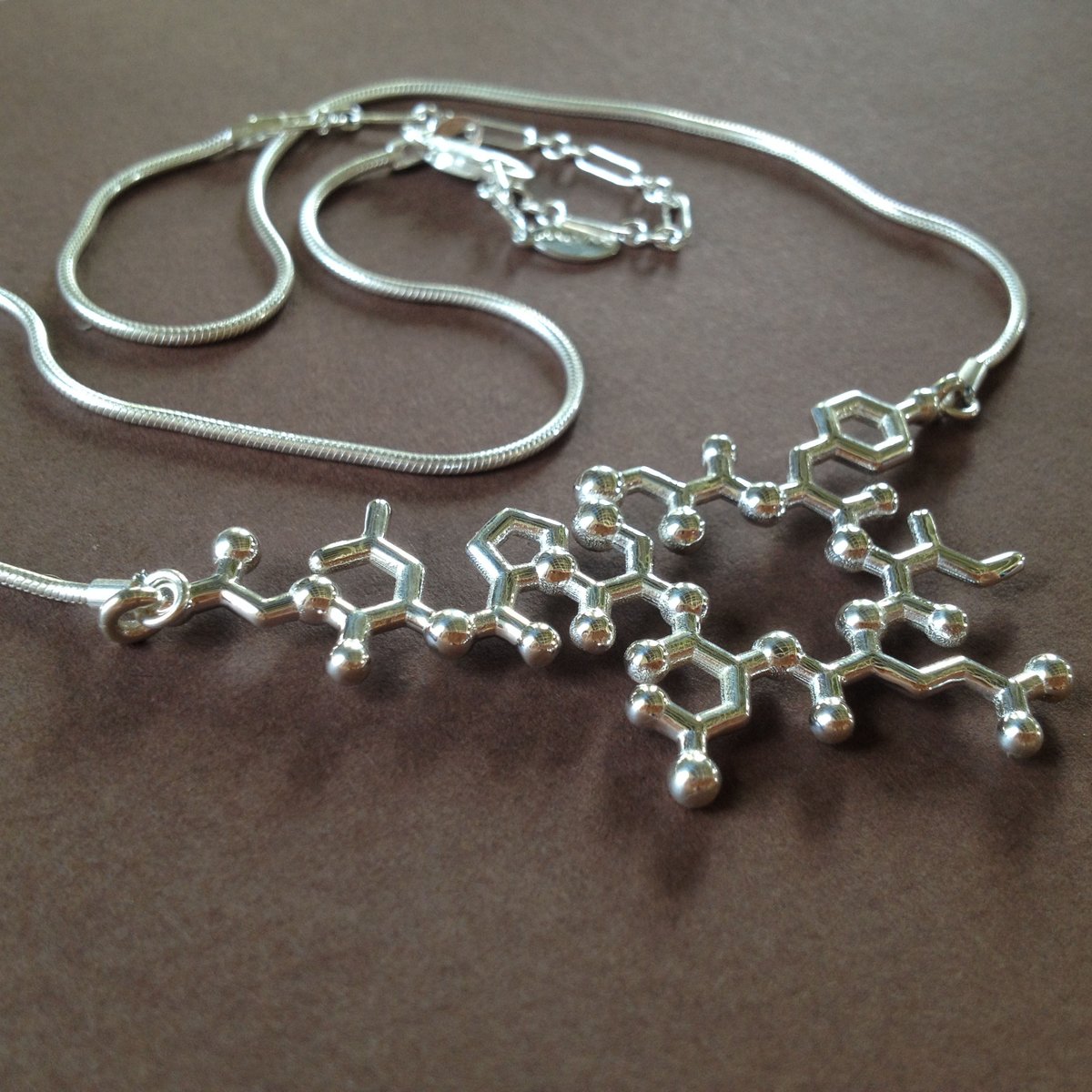 Image of oxytocin necklace - suspended