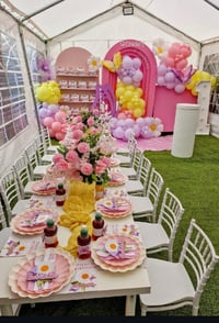 Kids white chiavari chairs  and tables setup 10 chairs per table not including the backdrop  