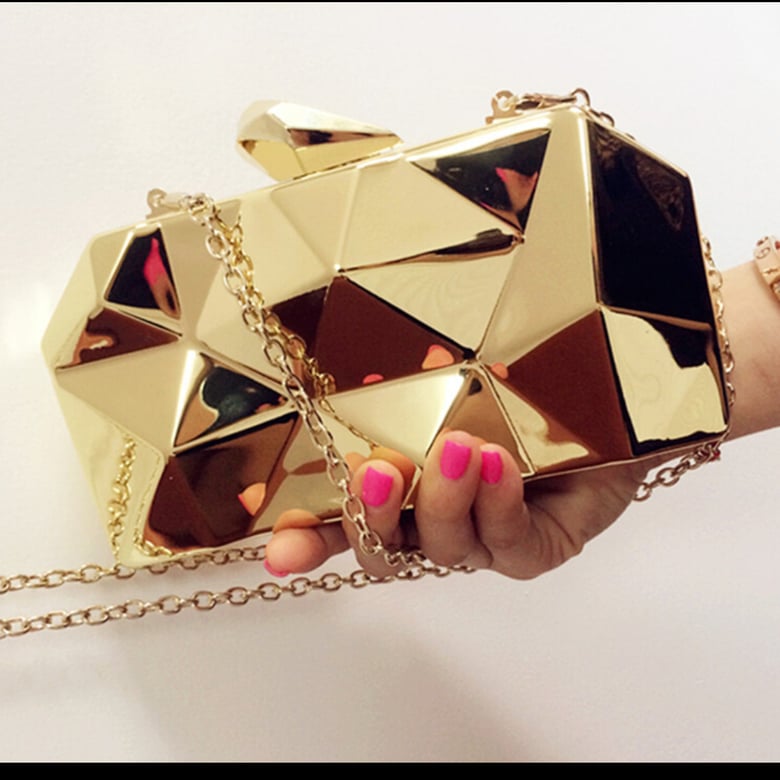 Image of Gold cluch purse