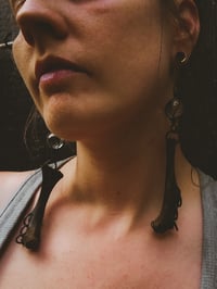 Image 2 of glass and bone