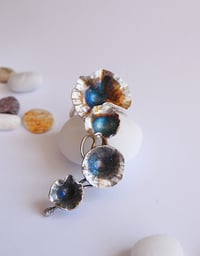 Image 1 of Trailing daisy ring forged in sterling silver with rainbow patina