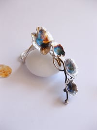 Image 5 of Trailing daisy ring forged in sterling silver with rainbow patina