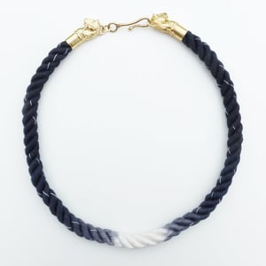 Image of Brass Horse Necklace with Black and White Cord