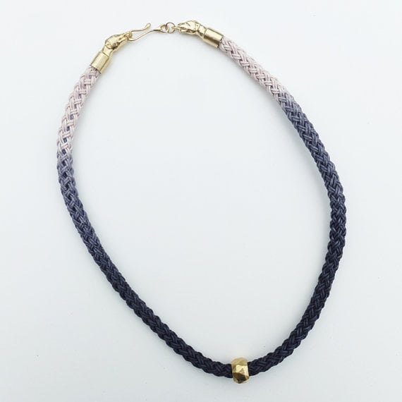 Image of Brass Dog Necklace with Gray and White Cotton Cord and Brass Bead