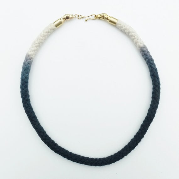 Image of Brass Dog Necklace with Black and White Cord
