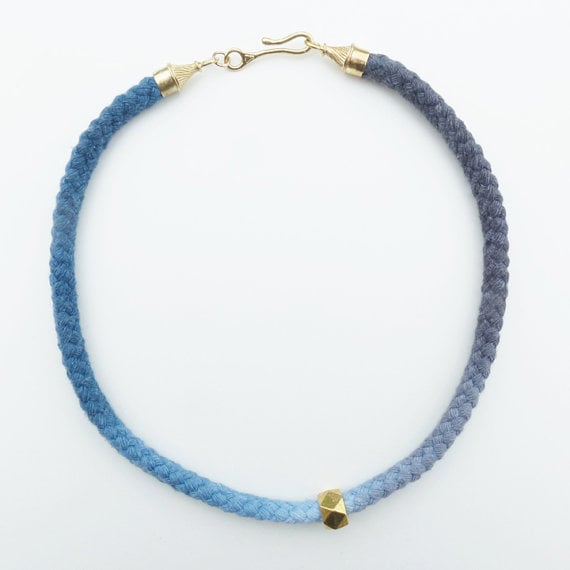 Image of Brass Swirl Necklace with Blue and Gray Cotton Cord and Brass Bead