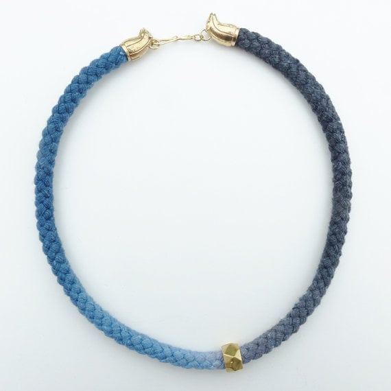 Image of Brass Rat Necklace with Blue and Gray Cord and Brass Bead