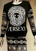 Image of VERSEXY LONG SLEEVE SHIRT AND SKIRT SET | $55.99 | FREE SHIPPING