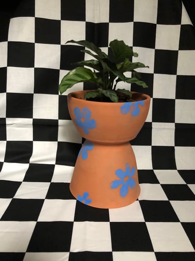 Image of Terra Cotta Pedestal Planter - Blue Daisy 8 X 6.25