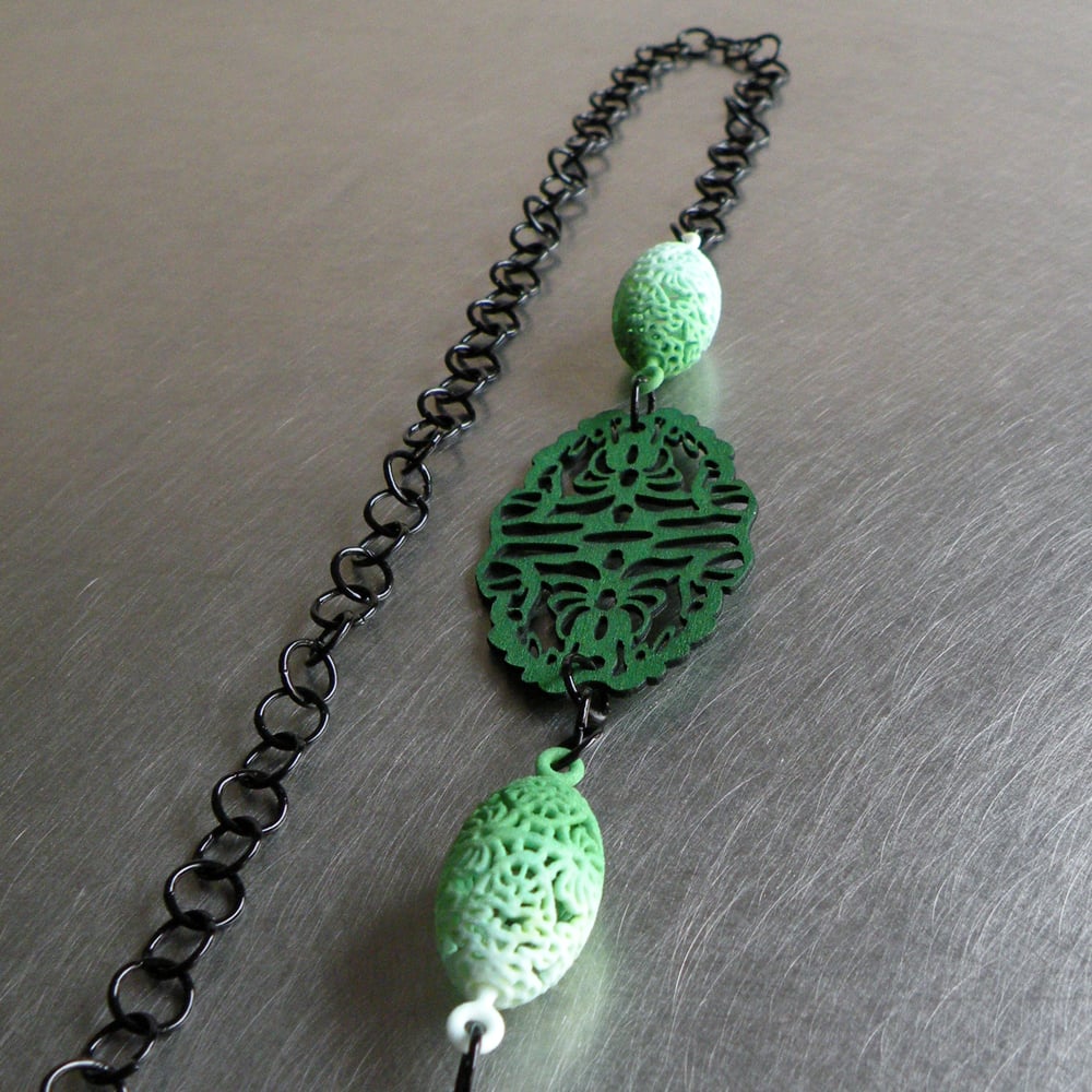 Image of 3D printed and lasered small necklace OVAL 2.floral 