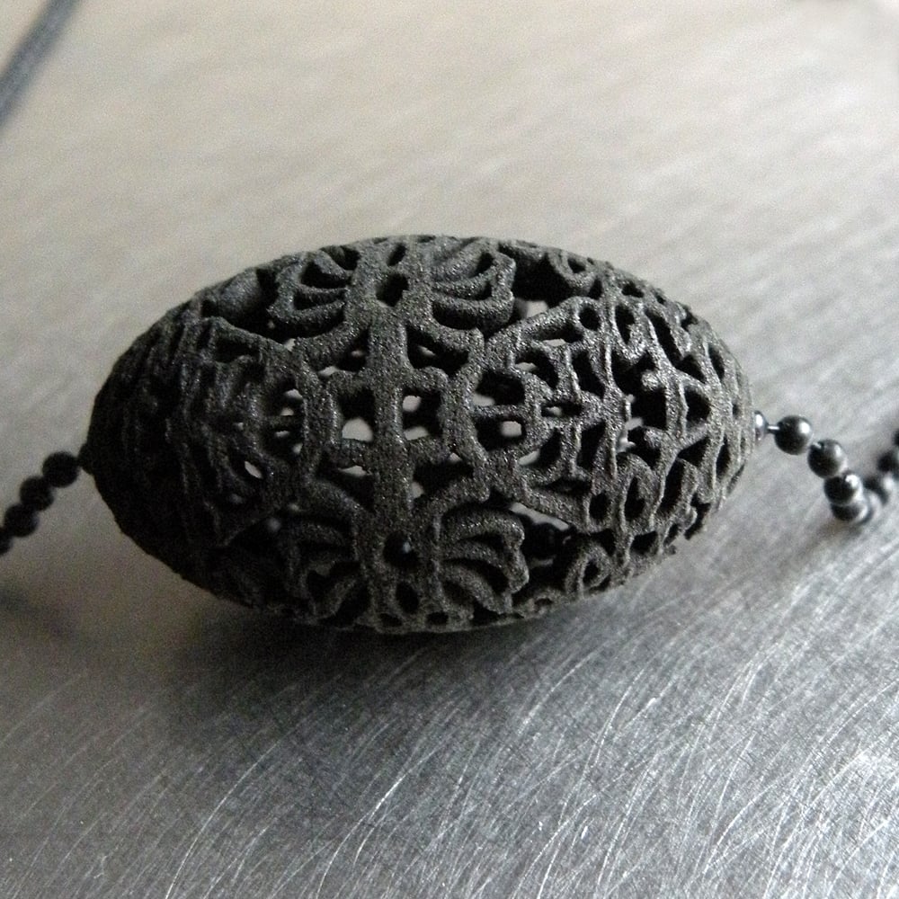 Image of 3D printed bead OVAL.floral 