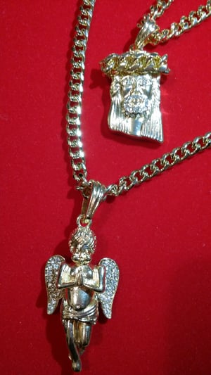 Image of 5.5mm gold link chain with angel/Jesus piece