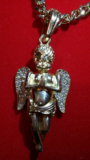 Image of 5.5mm gold link chain with angel/Jesus piece