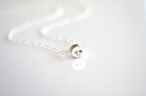 Image of Tiny Sterling Silver Skull Necklace