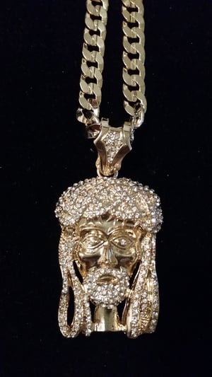Image of big Jesus piece with bling crown