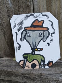 Image 1 of Dog Playing Guitar 