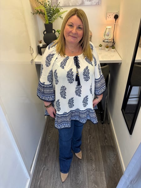 Image of PRINTED BARDOT TASSEL TUNIC TOP