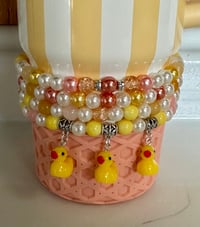 Image 1 of Rubber Ducky Tumbler Bracelet Stack – Yellow Duck Beaded Cup Charm Set