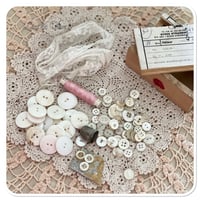 Image 2 of vintage french box full of buttons