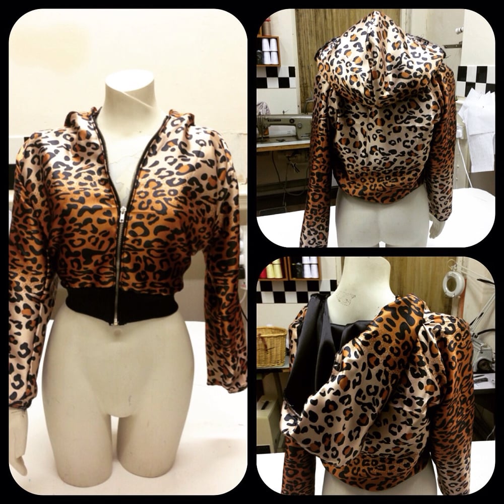 Image of Wrestling entrance jacket, leopard print silk with hood.