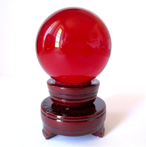Image of Red Crystal Ball with Wooden Stand