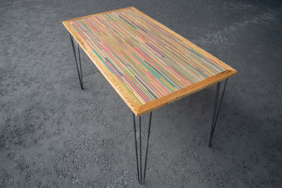 Image of Large broken skateboard and oak table