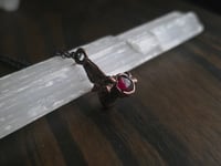 Image 2 of Mink vertebra with garnet 