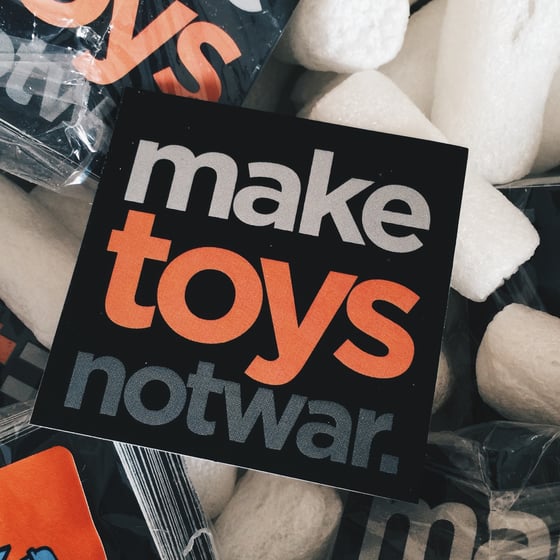Image of Make toys, not war Sticker