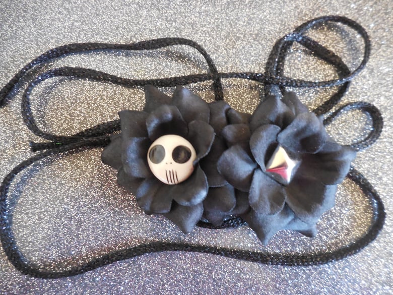 Image of Black skull & stud flower tie around headband