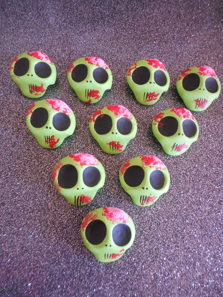 Image of Green zombie skull pin
