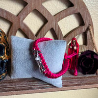 Image 2 of Red Eyed Santa Muerte Magenta Bracelet 