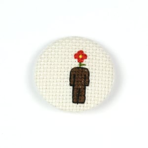 Image of Flowerman Cross-Stitched Button